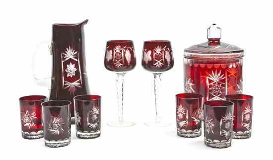 Appraisal: A Bohemian Cranberry Cut to Clear Partial Serving Set comprising