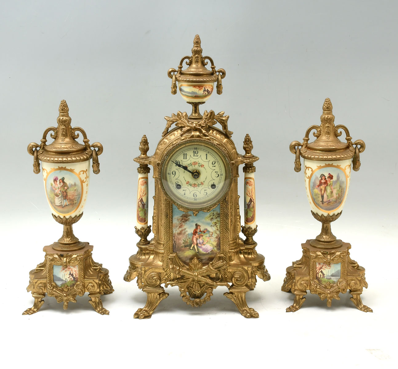 Appraisal: PC ITALIAN BRASS CLOCK GARNITURE Italian brass clock garniture set