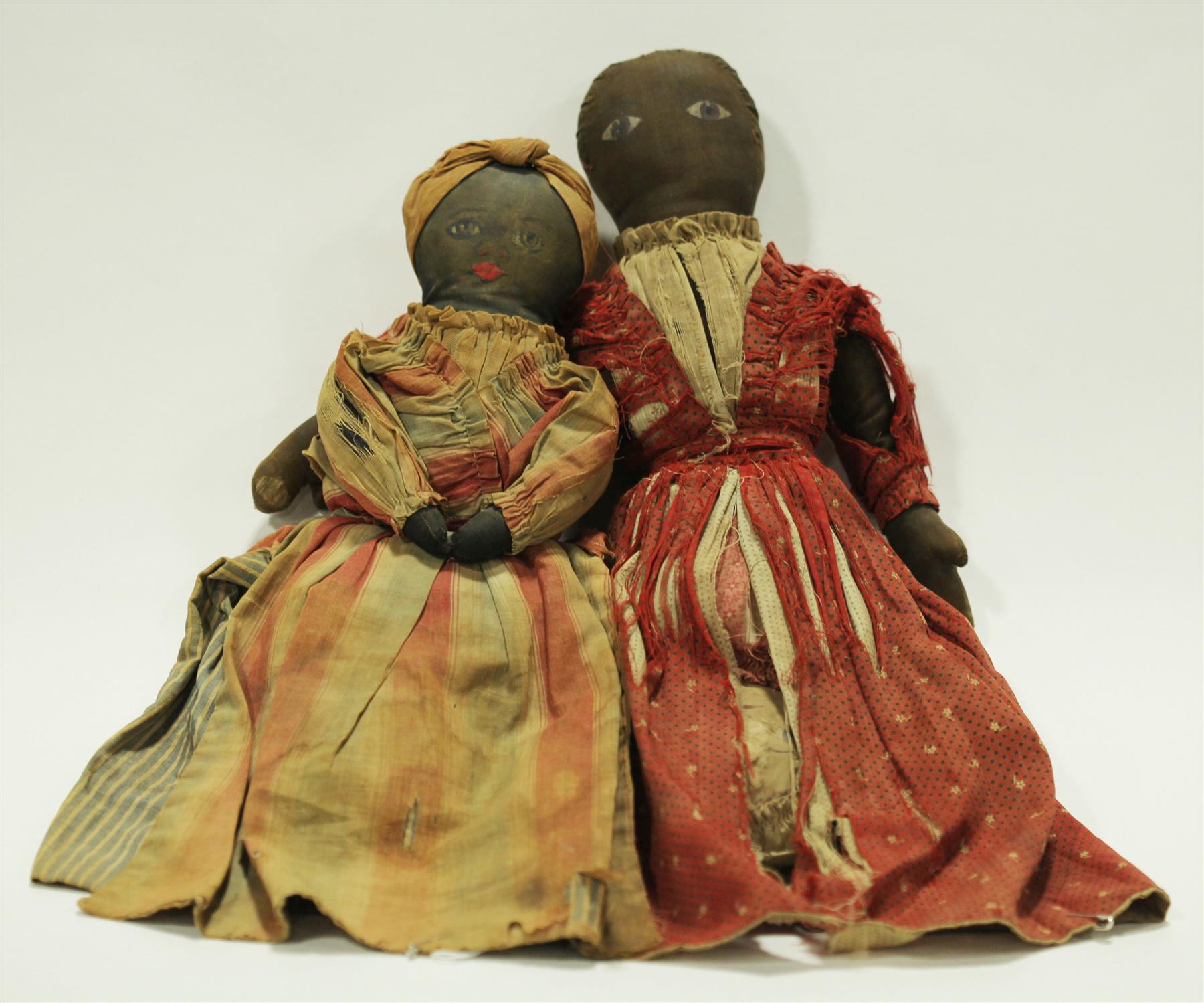 Appraisal: TWO EARLY TOPSY-TURVY DOLLS American late th-very early th century