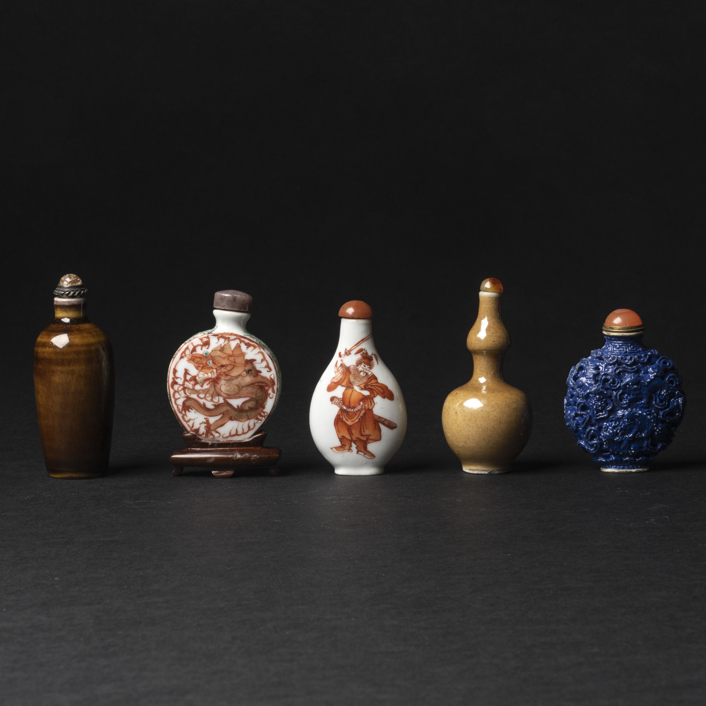 Appraisal: A Group of Five Porcelain Snuff Bottles th Century Consisting