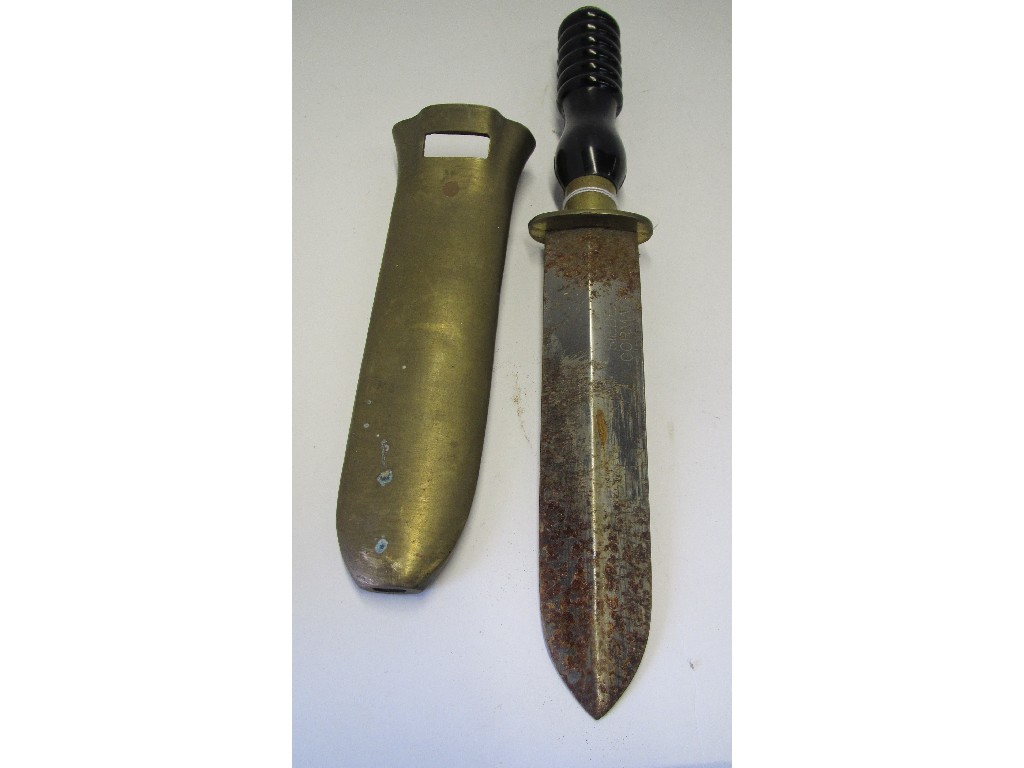 Appraisal: th century diver's knife in heavy brass scabbard the blade