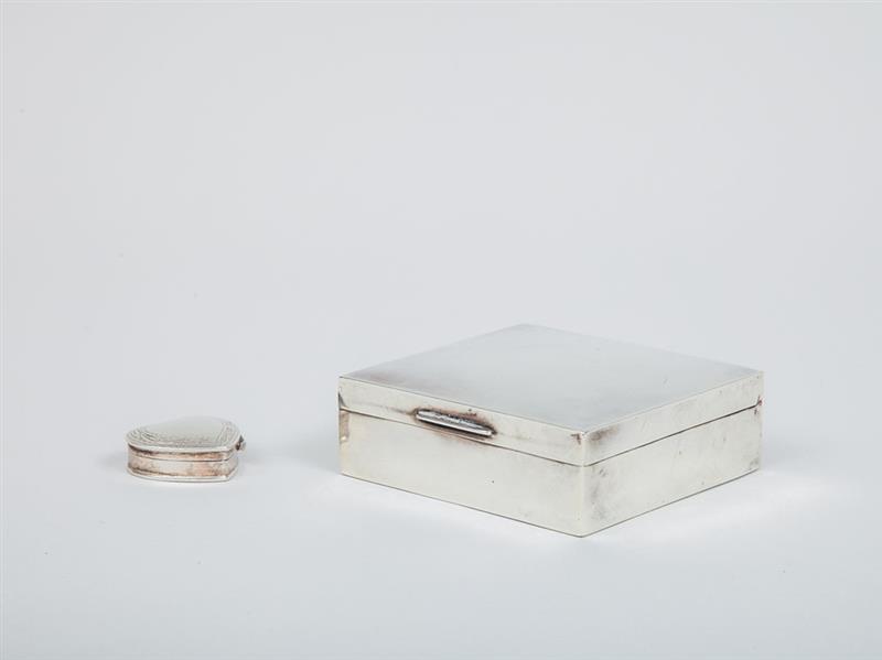 Appraisal: SILVER CIGARETTE BOX AND A SMALL SILVER HEART-SHAPED BOX x