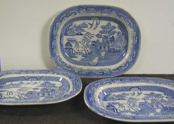 Appraisal: THREE STAFFORDSHIRE BLUE AND WHITE PLATTERS Transfer decorated ironstone in