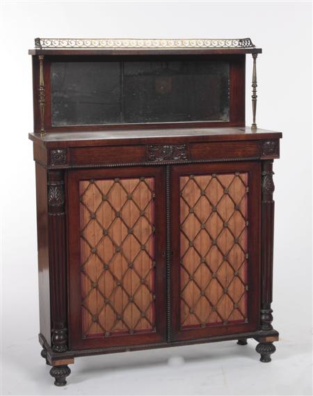 Appraisal: A Regency rosewood chiffonier the pierced brass gallery over single