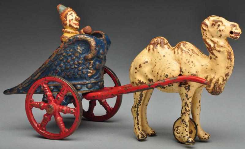 Appraisal: Cast Iron Kenton Chariot Camel-Drawn Toy Description American Original clown