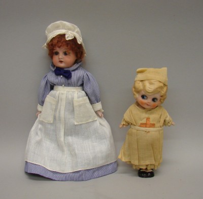 Appraisal: Pair of bisque nurse dolls All bisque blonde Betty Boop