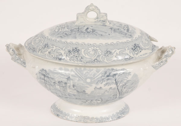 Appraisal: English oblong covered soup tureen with applied handles romantic Middle