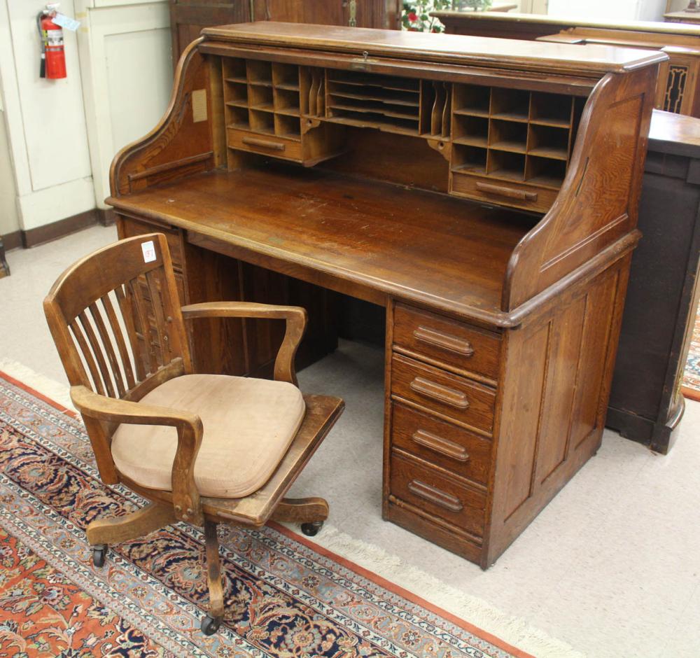 Appraisal: AN OAK ROLL-TOP DESK WITH CHAIRS The Rand Leopold Desk