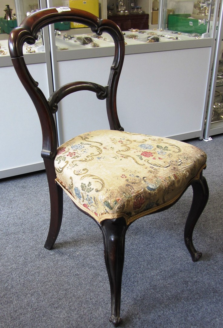 Appraisal: A set of six Victorian rosewood framed dining chairs with