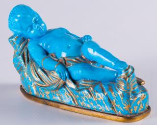 Appraisal: Blue Child Figurine Reposed on Brass Base Decorative figure of