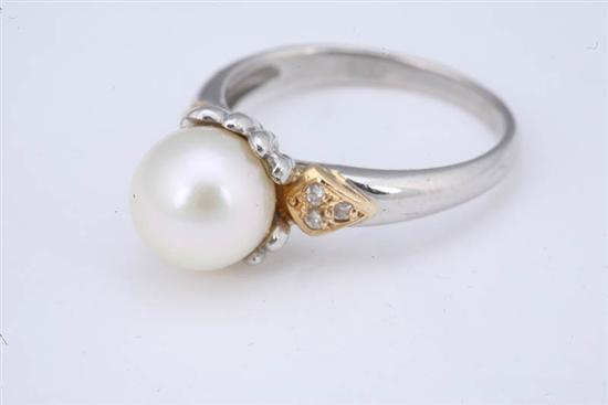 Appraisal: PEARL AND DIAMOND RING Center mm pearl is accented by