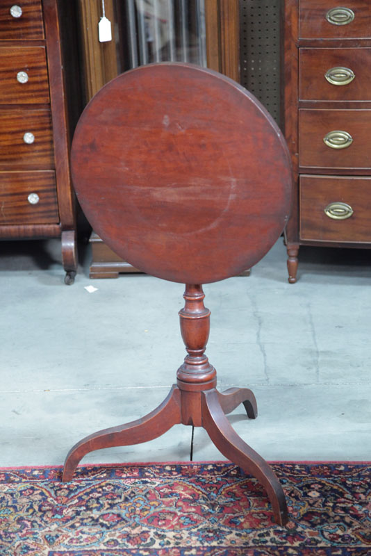 Appraisal: TILT TOP CANDLESTAND Cherry having a round top turned pedastal