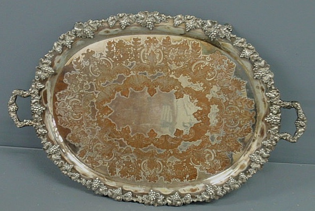 Appraisal: Silverplate serving tray Chippendale style with ball and claw feet