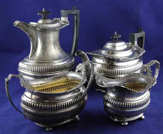 Appraisal: A George V silver four piece tea set of rounded