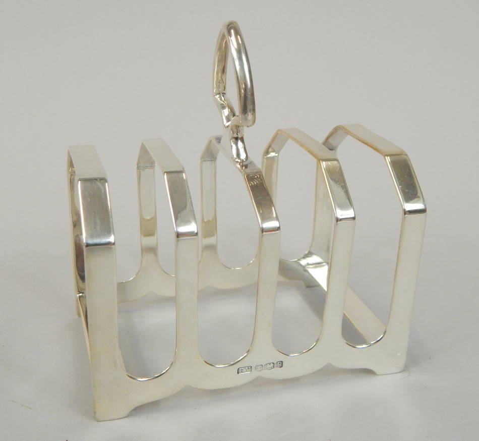 Appraisal: A George V silver four division toast rack with shaped