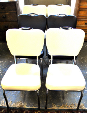 Appraisal: Set of six leather and chrome framed dining chairs in