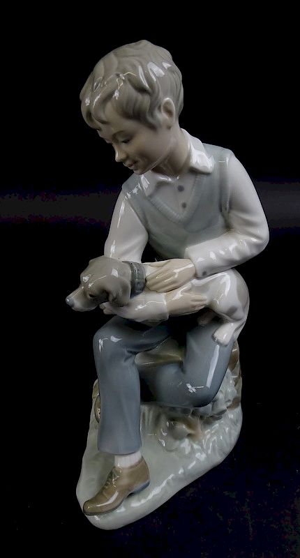 Appraisal: Nao Lladro Porcelain Figure Depicting Boy w Dog Lladro Boy