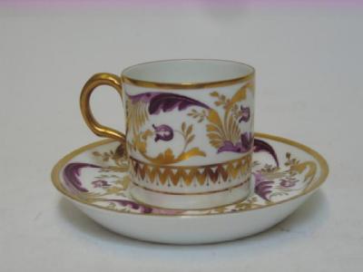 Appraisal: A ROYAL CROWN DERBY COFFEE CAN AND SAUCER c painted