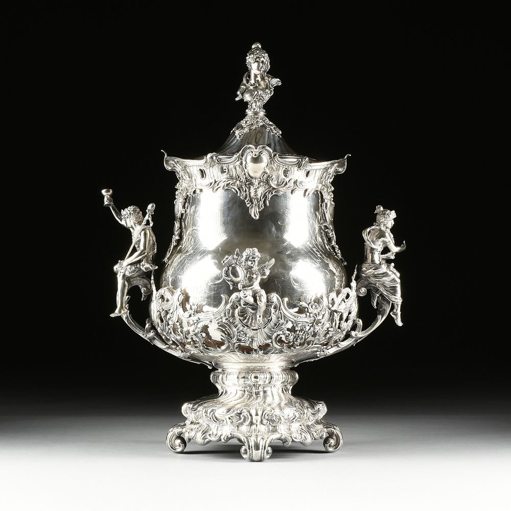 Appraisal: A ROCOCO REVIVAL STYLE SILVERPLATED AND LIDDED PUNCH URN TH