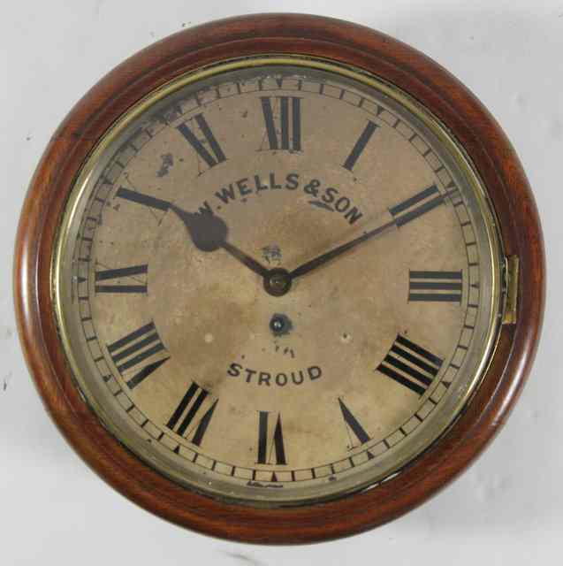 Appraisal: A circular wall clock the dial with Roman numerals signed