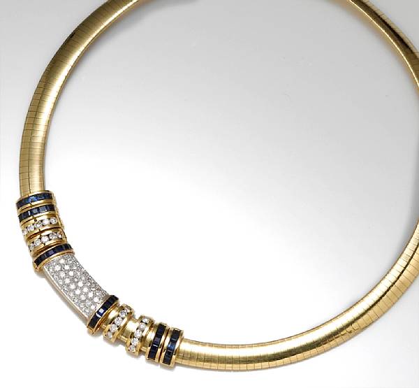 Appraisal: A diamond and sapphire omega slide necklace Kurt Gutmann signed