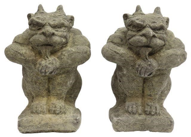 Appraisal: pair Cast stone garden statuary horned gargoyles seated with their