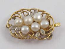 Appraisal: A carat gold pearl and diamond clasp