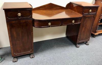 Appraisal: A Regency mahogany twin pedestal sideboard the bowfront fitted two