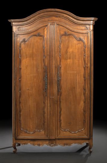 Appraisal: Provincial Louis XV-Style Cherrywood Armoire second quarter th century the