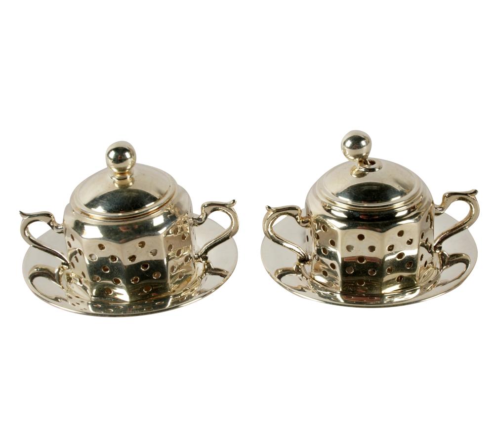 Appraisal: TWO TIFFANY CO STERLING TEA STRAINERSwith maker's mark further marked