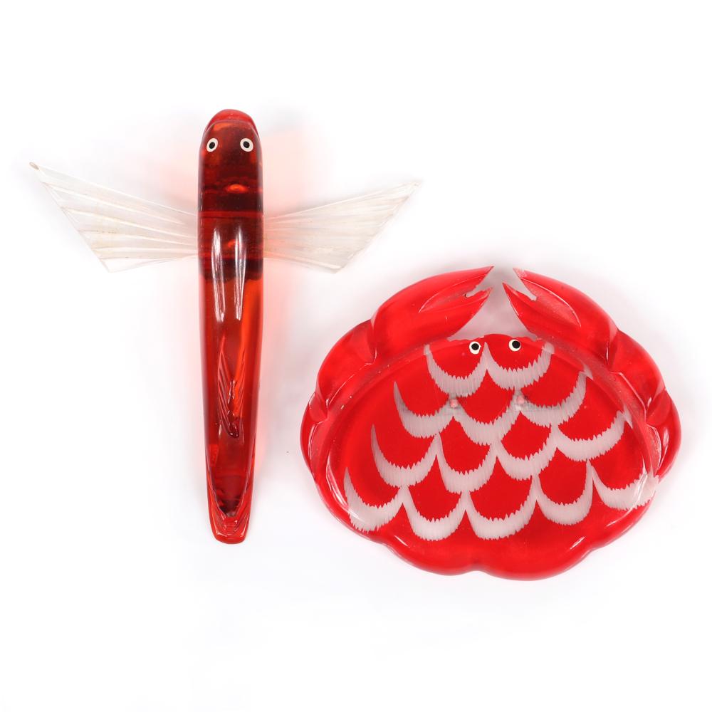 Appraisal: LARGE LUCITE REVERSE CARVED RED CRAB PIN AND AMBER FLYING