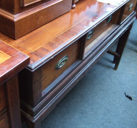 Appraisal: An early th century converted mahogany sideboard with frieze drawers