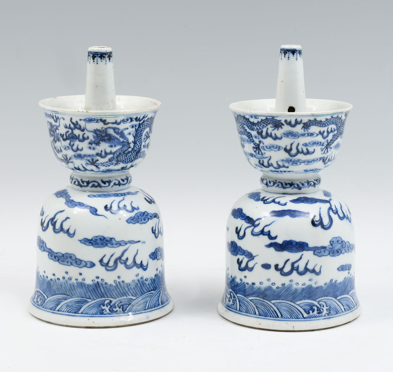 Appraisal: BLUE WHITE CHINESE PORCELAIN CANDLESTICKS Pair of Chinese porcelain blue