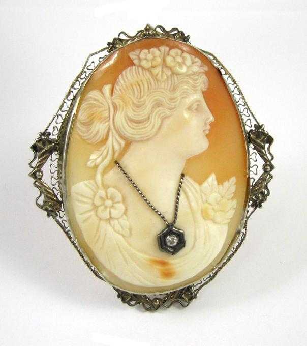 Appraisal: VICTORIAN CAMEO PENDANT BROOCH framed in k yellow gold is