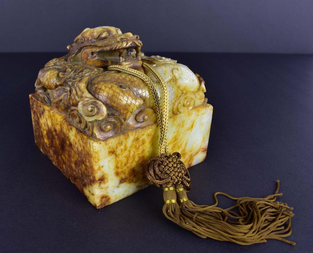 Appraisal: LARGE CHINESE WHITE AND BROWN JADE DRAGON SEAL th Century