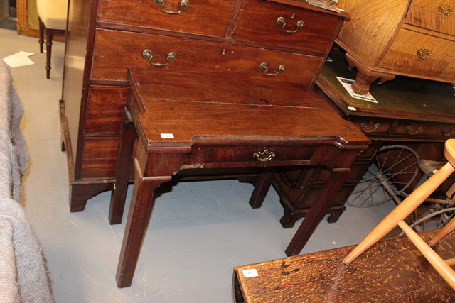 Appraisal: A GEORGIAN MAHOGANY CONCERTINA ACTION FOLD OVER TEA TABLE with