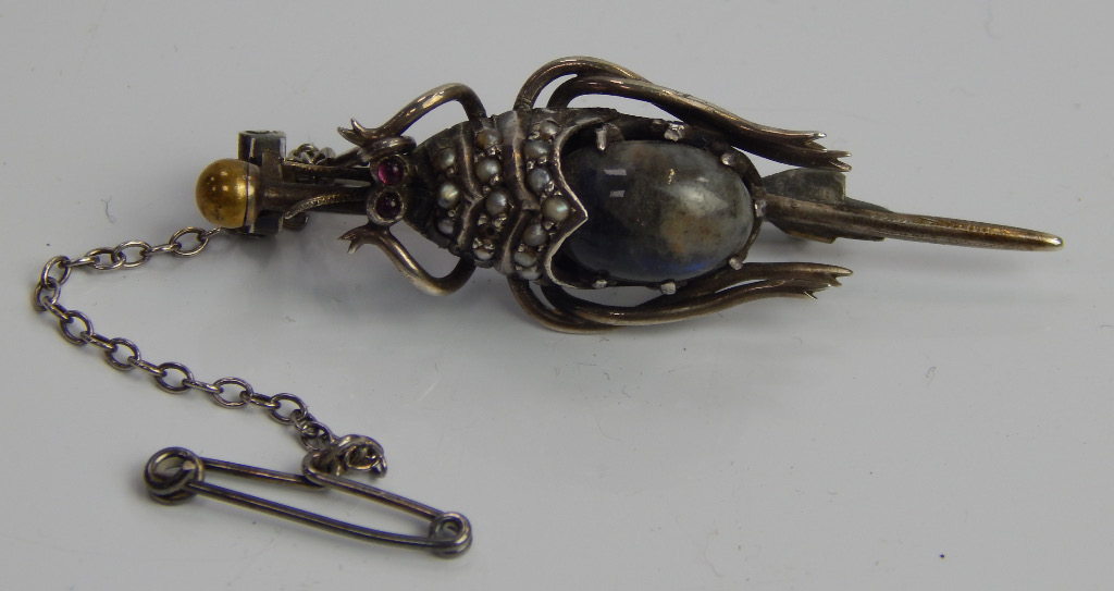 Appraisal: A decorative insect bar brooch in the shape of a