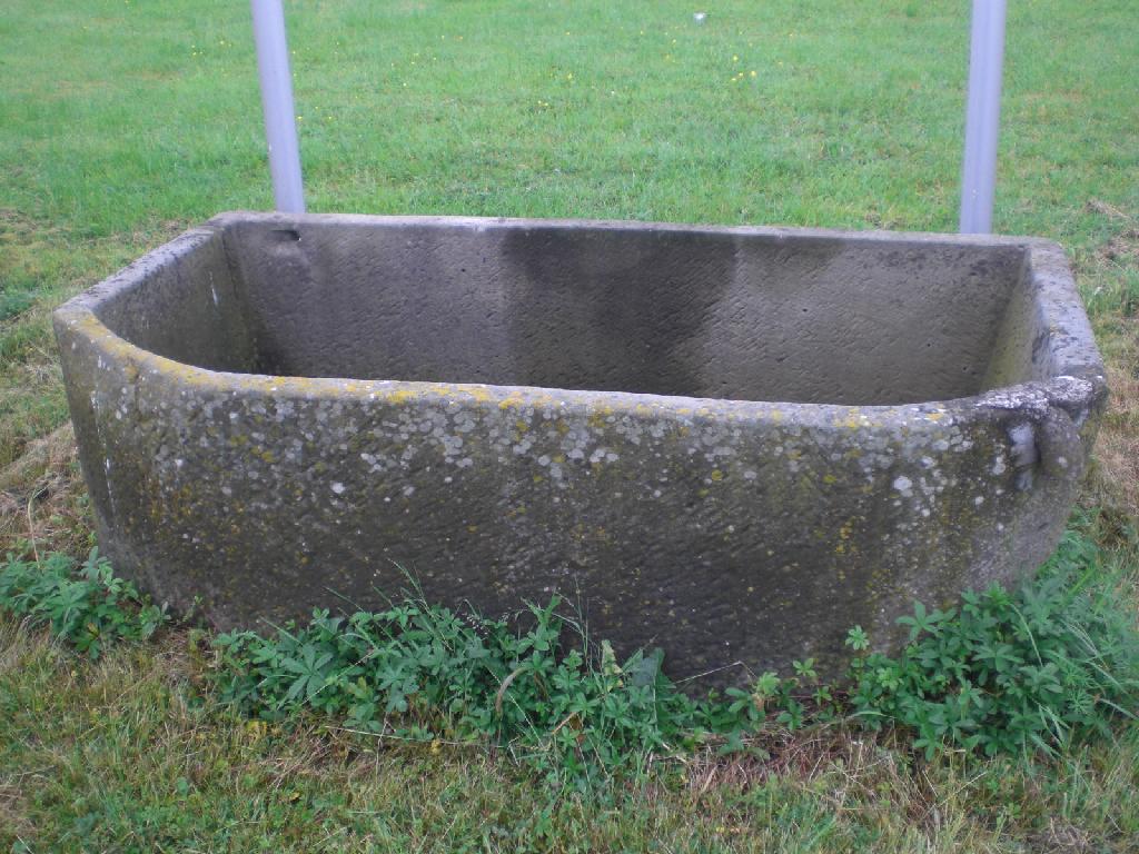 Appraisal: A large stone Trough two chamfered corners ft approx W