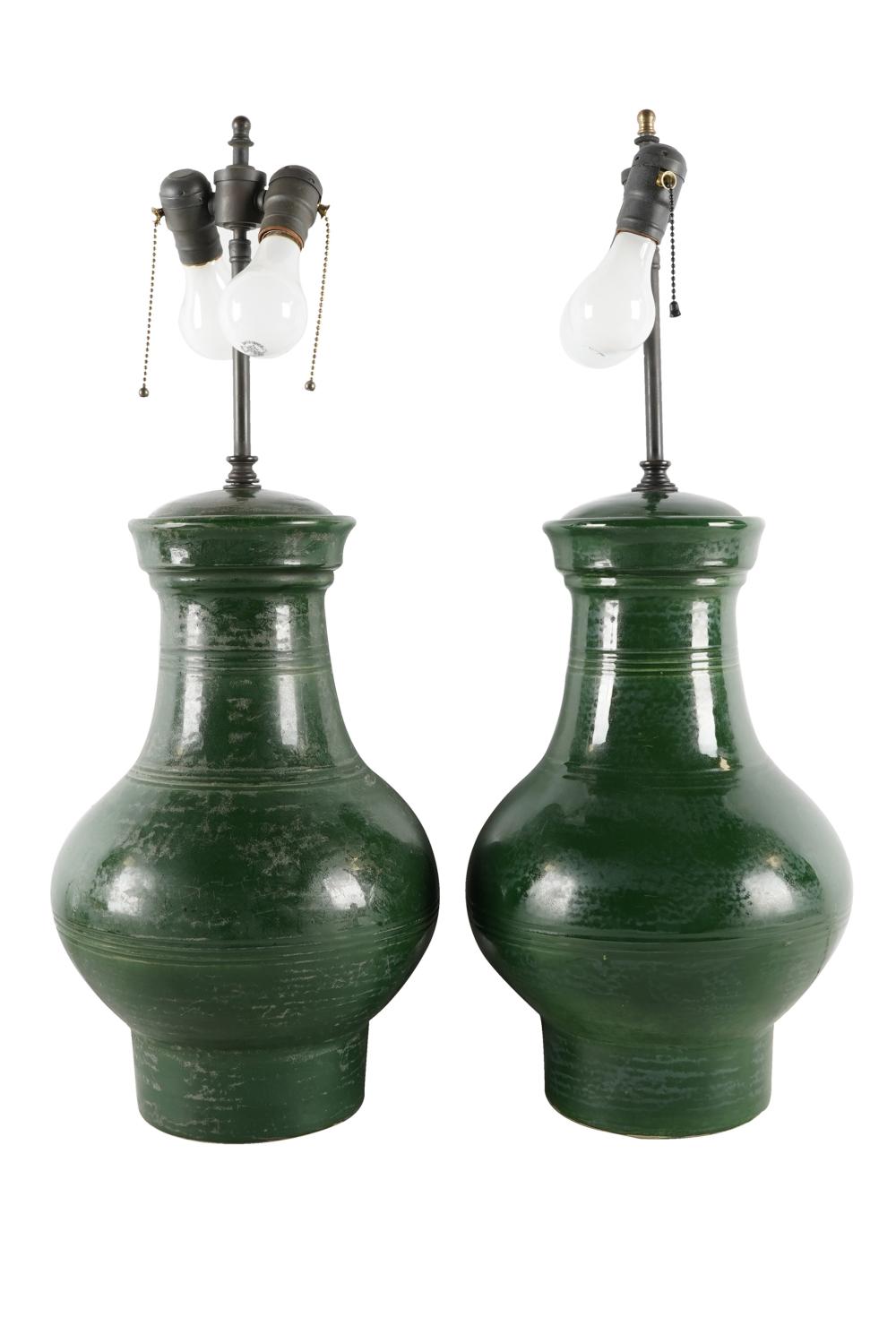 Appraisal: PAIR OF GREEN-GLAZED CERAMIC TABLE LAMPSunsigned urns inches high inches