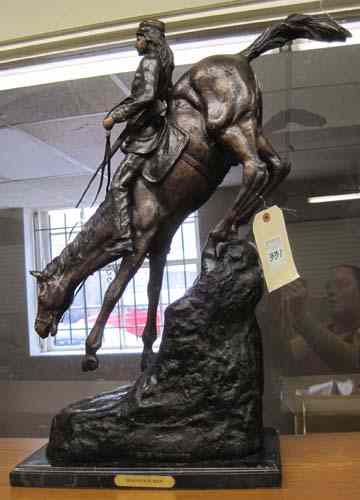 Appraisal: TWO WESTERN BRONZE SCULPTURES after the work of Frederic Sackrider