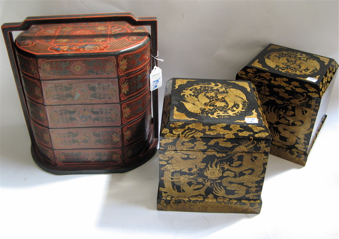 Appraisal: THREE CHINESE WOODEN STACKING COVERED BOXES five tiered ovoid-shaped storage