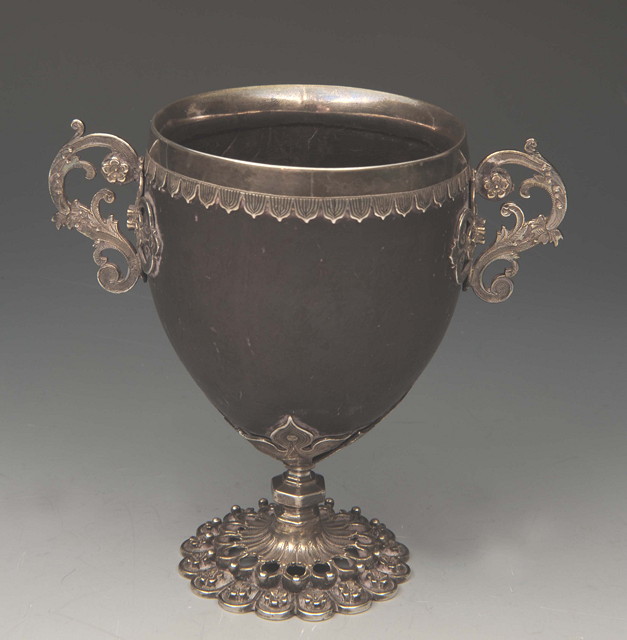 Appraisal: A SMALL CONTINENTAL WHITE METAL probably silver mounted coconut cup