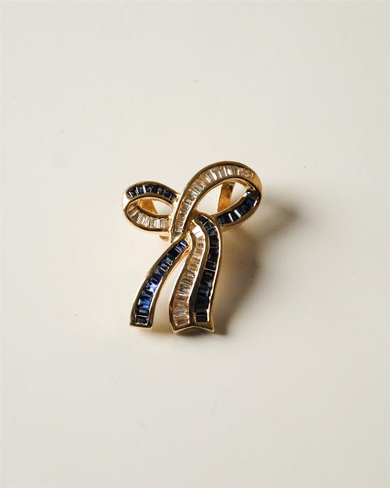 Appraisal: Yellow Gold Bow Pendant Slide with Baguette-cut Diamonds and Sapphires