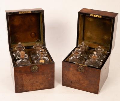 Appraisal: A pair of th Century mahogany decanter boxes each with