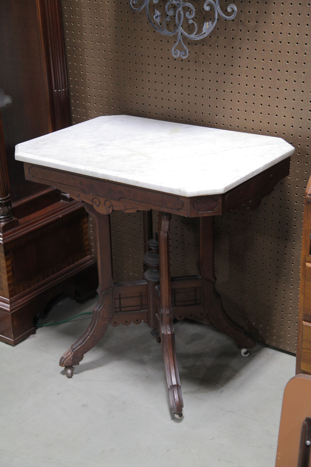 Appraisal: VICTORIAN PARLOR STAND American late th century White marble top