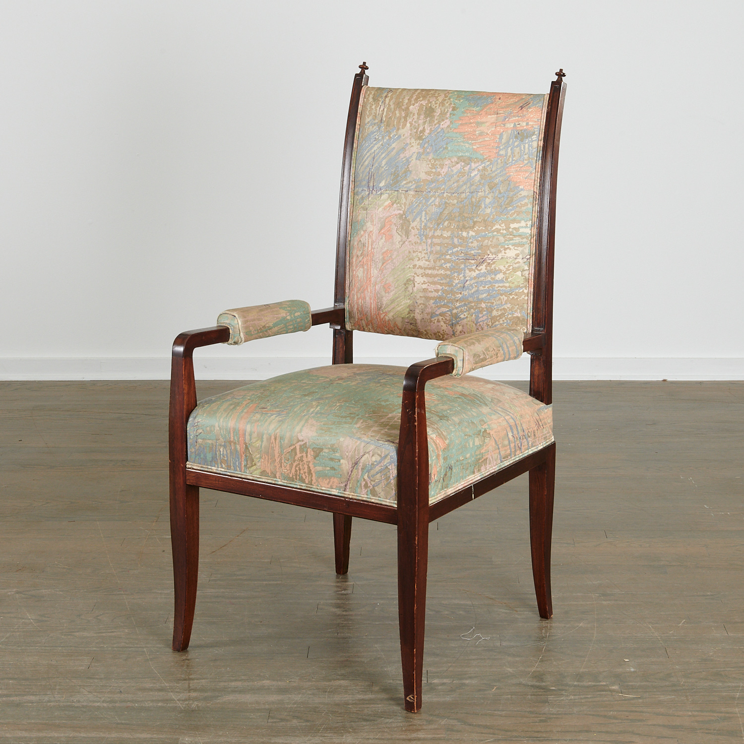 Appraisal: TOMMI PARZINGER MAHOGANY ARMCHAIR c s American dark stained mahogany