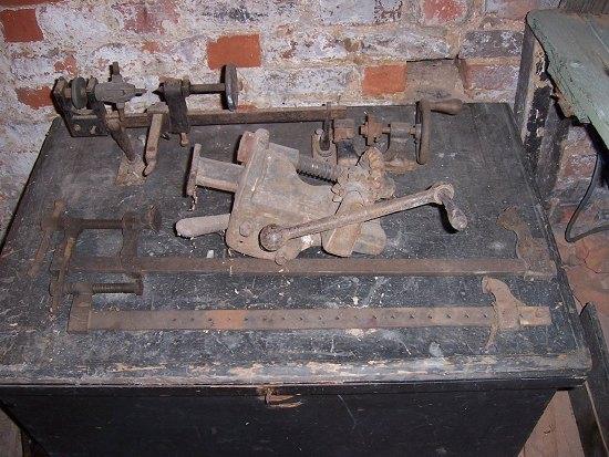 Appraisal: A lathe a pair of clamps and a cart jack