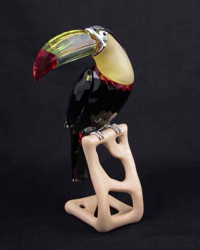 Appraisal: SWAROVSKI CRYSTAL FIGURAL TOUCAN Roland Schuster designer faceted black diamond