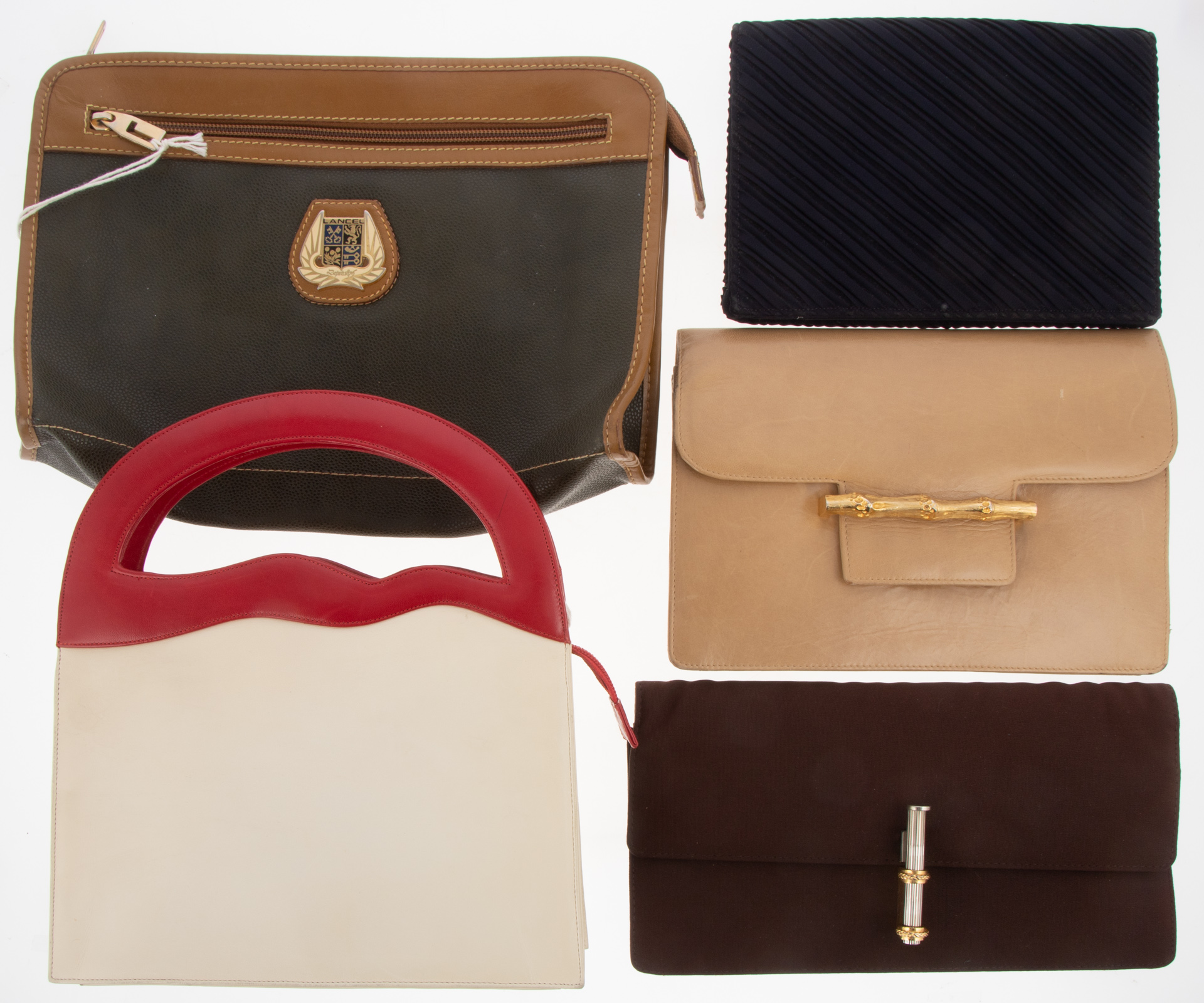 Appraisal: FIVE ASSORTED HANDBAGS including a Francois Villon beige clutch Mark