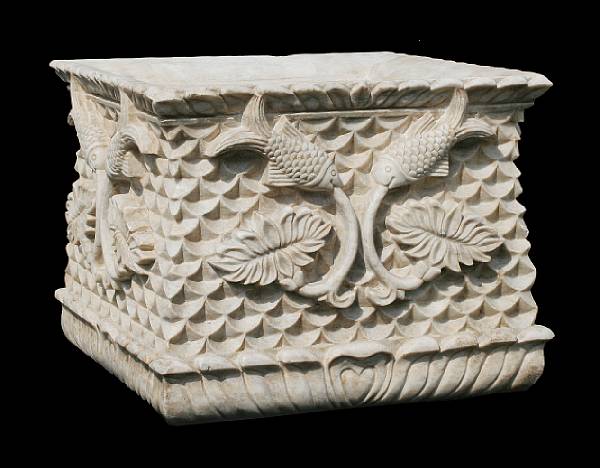 Appraisal: A carved marble jardiniere modern Decorated with fish and foliage